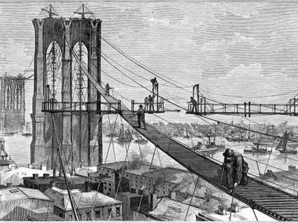 an old photo of Brooklyn Bridge