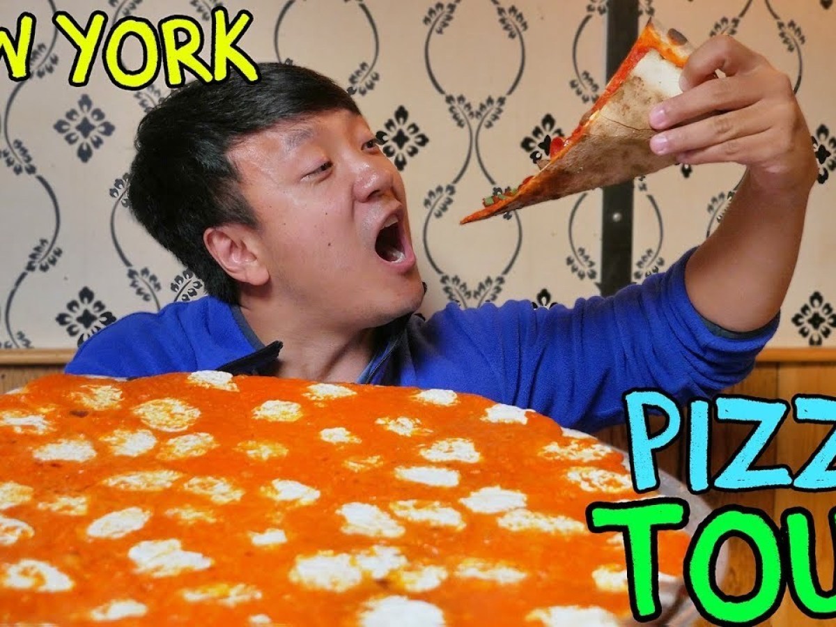 a close up of a person holding a piece of cake